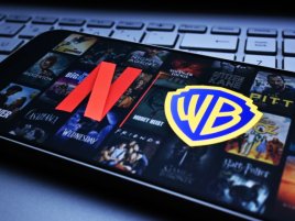Netflix chce Warner Bros. koupit bez akcií a bez rizika